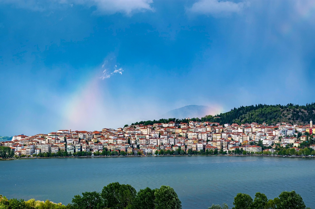 city, lake, rainbow, greece, hill, mountain, buildings, urban, sky, clouds, nature, scenic