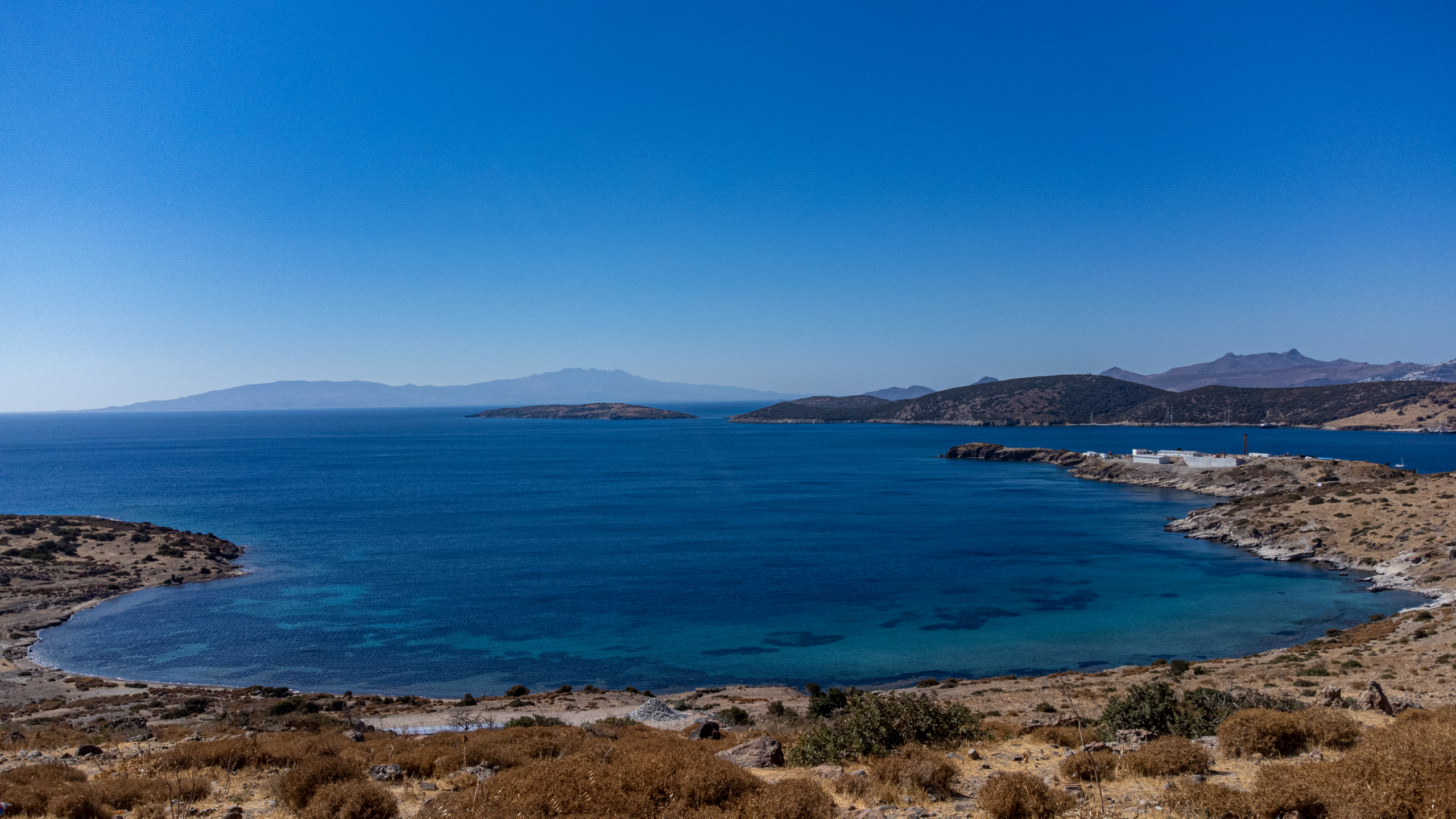 Scenic aerial view of Bodrum's beautiful coastline, turquoise waters, and distant islands.